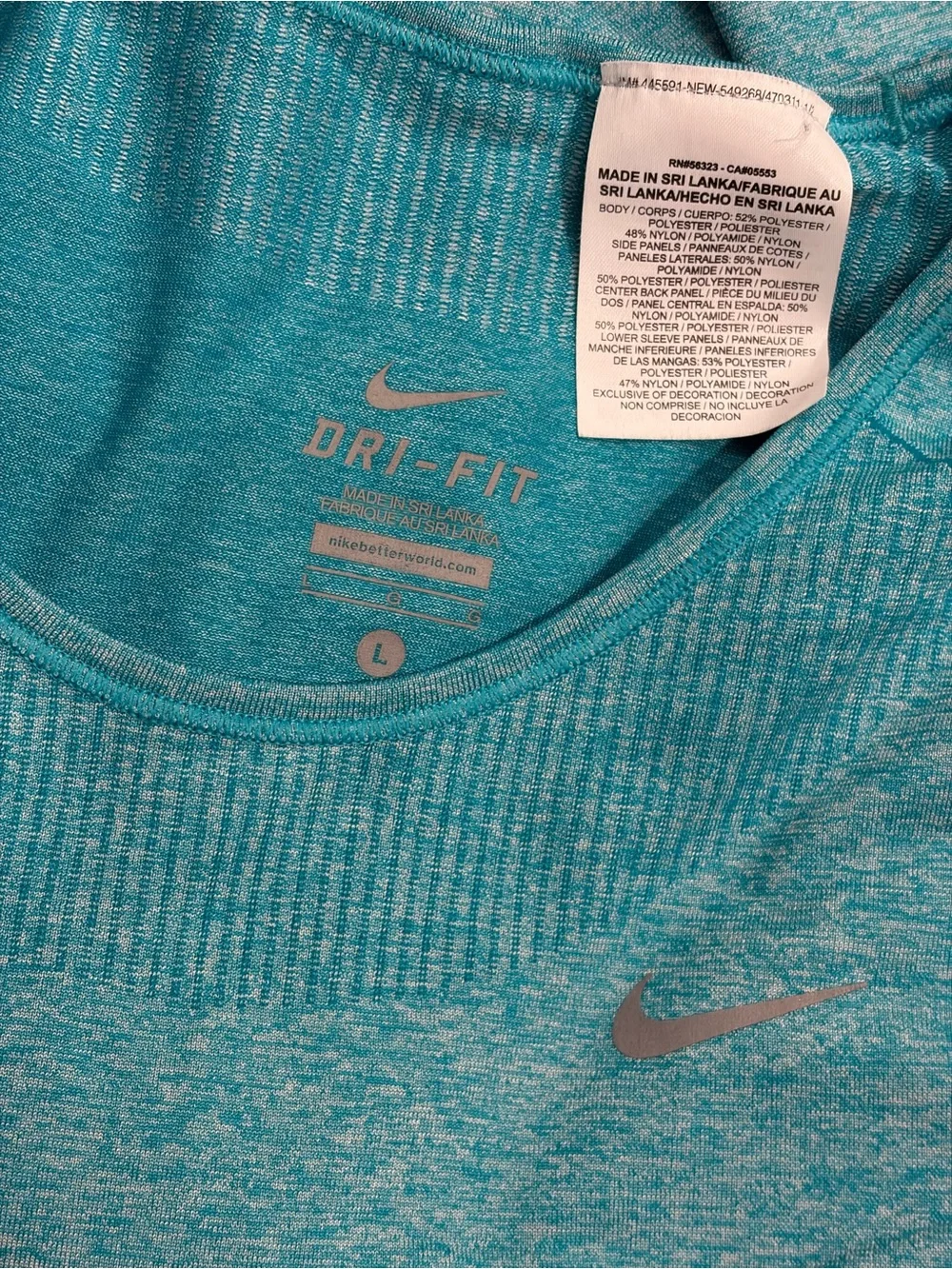 Nike Dry Fit turquoise women’s long-sleeve top